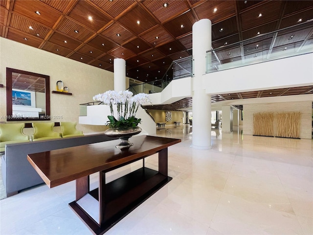 201 Crandon Blvd Unit 305, Key Biscayne, FL 33149 - community lobby with a high ceiling, wood ceiling, and coffered ceiling