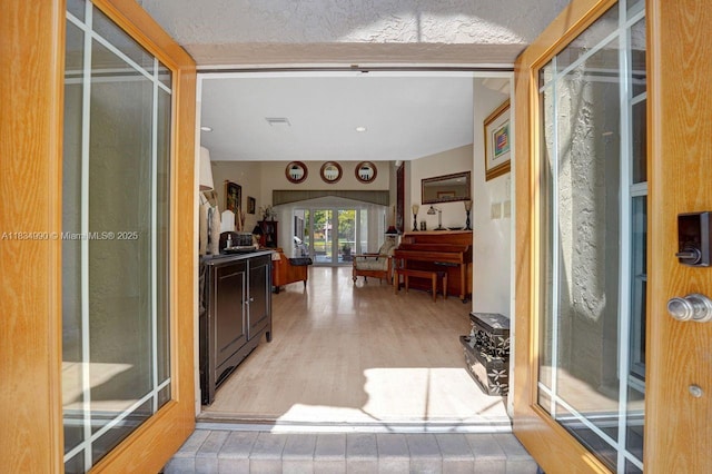 9940 SW 4th St, Plantation, FL 33324 - foyer entrance featuring wood finished floors