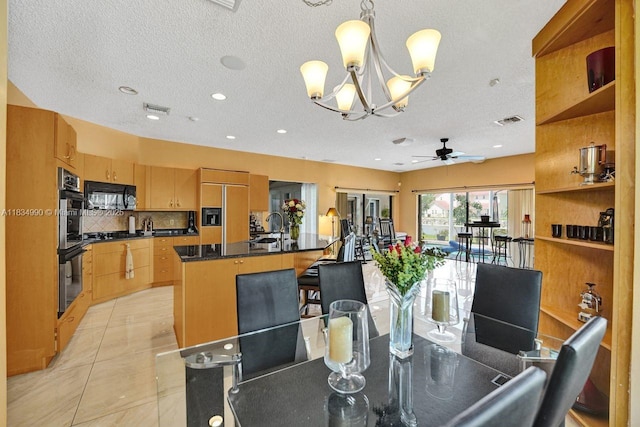 9940 SW 4th St, Plantation, FL 33324 - dining room featuring a ceiling fan, a chandelier, a textured ceiling, light tile patterned floors, and recessed lighting