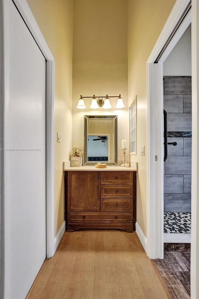 9940 SW 4th St, Plantation, FL 33324 - bathroom featuring wood finished floors and vanity