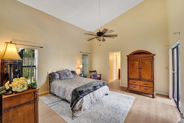 9940 SW 4th St, Plantation, FL 33324 - bedroom featuring high vaulted ceiling, light wood finished floors, and a ceiling fan