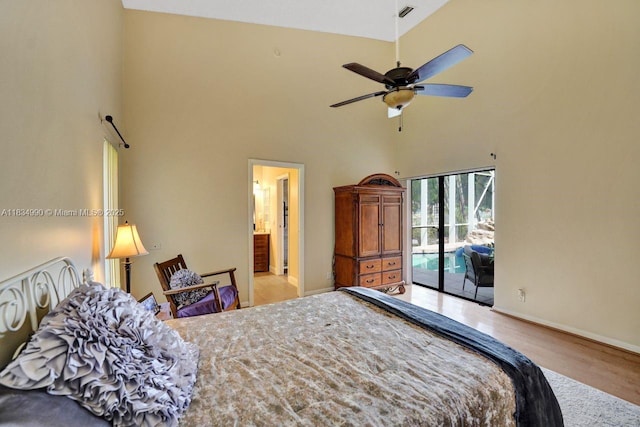 9940 SW 4th St, Plantation, FL 33324 - bedroom featuring access to outside, wood finished floors, and a high ceiling