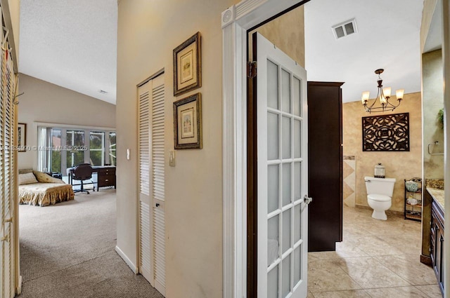 9940 SW 4th St, Plantation, FL 33324 - hall with a chandelier and high vaulted ceiling