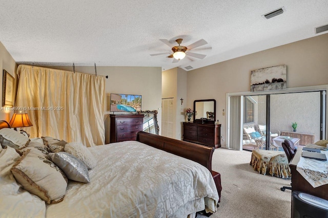 9940 SW 4th St, Plantation, FL 33324 - carpeted bedroom with access to exterior, a textured ceiling, lofted ceiling, a ceiling fan, and multiple windows