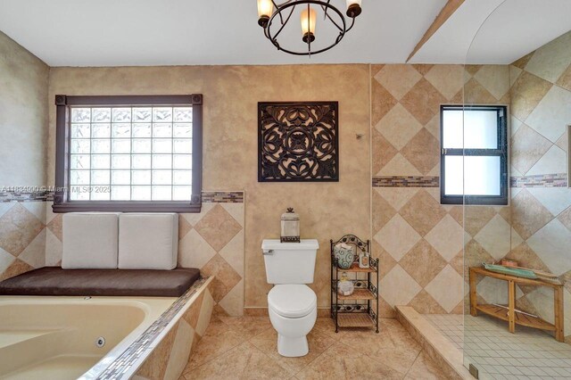 9940 SW 4th St, Plantation, FL 33324 - full bath with a jetted tub, a chandelier, tiled shower, and tile patterned flooring