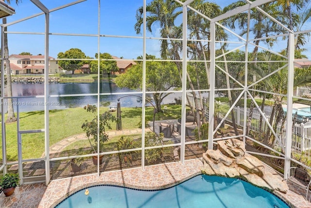 9940 SW 4th St, Plantation, FL 33324 - outdoor pool featuring glass enclosure, a water view, a patio, and a yard