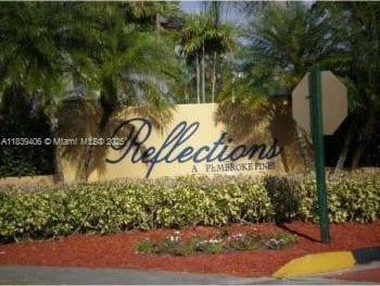 2091 NW 96th Ter Unit 13A, Pembroke Pines, FL 33024 - view of community sign