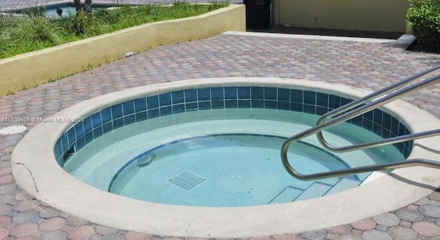 2091 NW 96th Ter Unit 13A, Pembroke Pines, FL 33024 - view of swimming pool with a hot tub