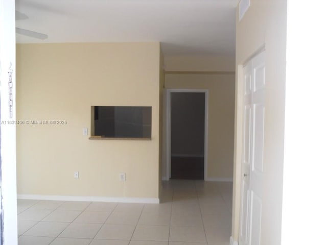2091 NW 96th Ter Unit 13A, Pembroke Pines, FL 33024 - empty room featuring tile patterned flooring and baseboards