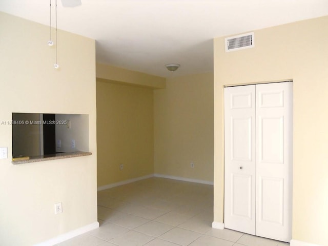 2091 NW 96th Ter Unit 13A, Pembroke Pines, FL 33024 - unfurnished living room featuring tile patterned floors and baseboards
