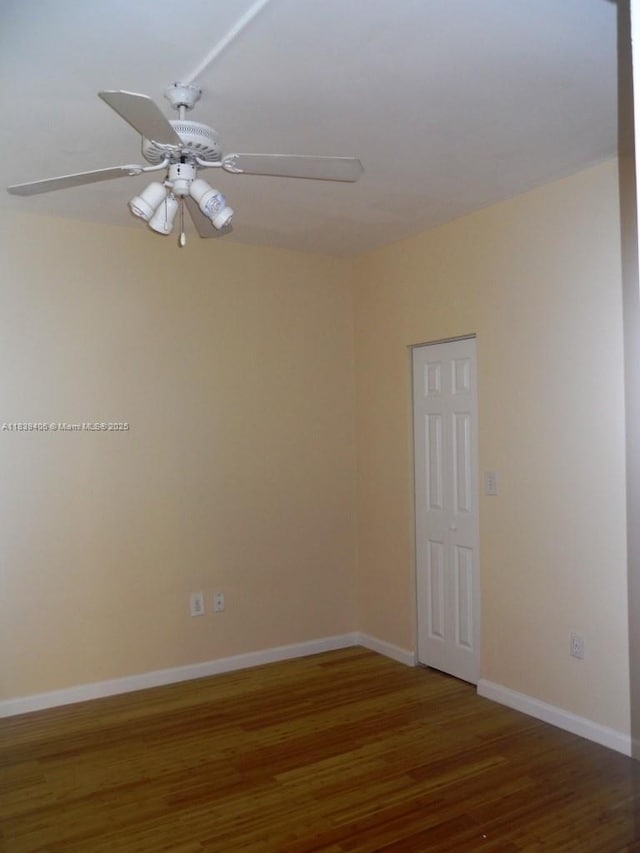 2091 NW 96th Ter Unit 13A, Pembroke Pines, FL 33024 - empty room with wood finished floors and a ceiling fan