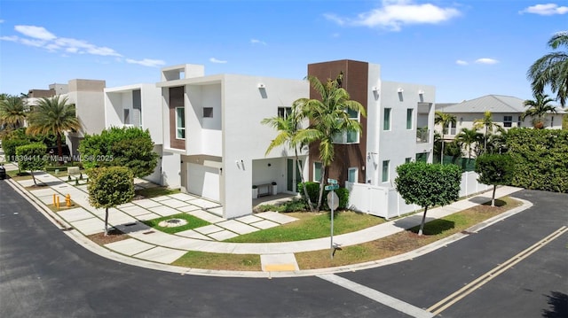 10431 NW 68th Ter, Doral, FL 33178 - view of building exterior featuring a residential view and a garage