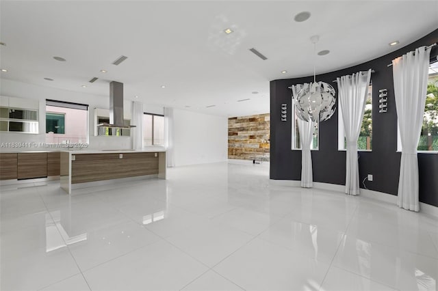 10431 NW 68th Ter, Doral, FL 33178 - unfurnished living room with light tile patterned floors and recessed lighting