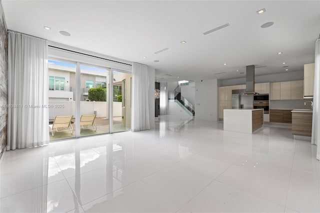 10431 NW 68th Ter, Doral, FL 33178 - unfurnished living room featuring light tile patterned flooring and recessed lighting