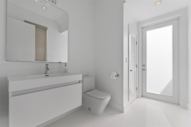10431 NW 68th Ter, Doral, FL 33178 - bathroom with vanity and tile patterned flooring