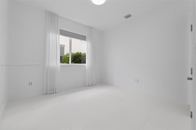 10431 NW 68th Ter, Doral, FL 33178 - empty room with tile patterned floors