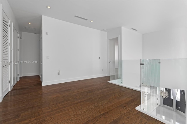 10431 NW 68th Ter, Doral, FL 33178 - unfurnished room featuring wood finished floors and recessed lighting