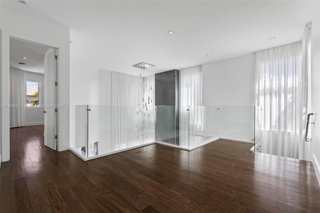 10431 NW 68th Ter, Doral, FL 33178 - spare room featuring wood finished floors