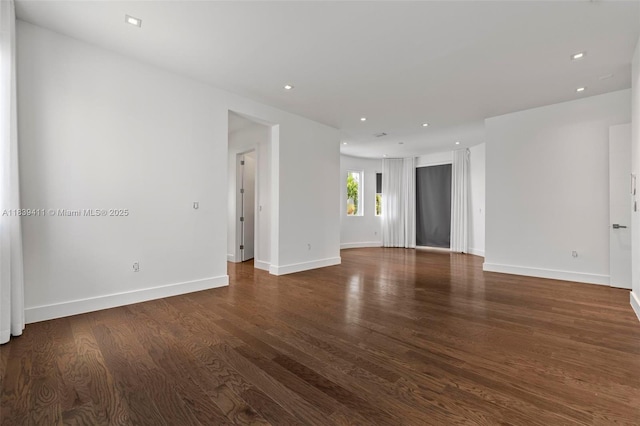 10431 NW 68th Ter, Doral, FL 33178 - empty room with wood finished floors and recessed lighting