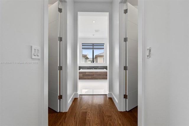 10431 NW 68th Ter, Doral, FL 33178 - hallway with wood finished floors and baseboards