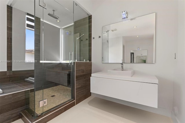 10431 NW 68th Ter, Doral, FL 33178 - full bathroom with a shower stall, vanity, and tile patterned flooring