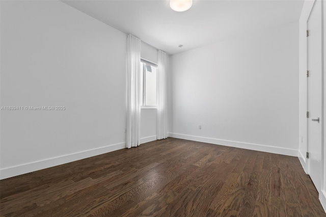 10431 NW 68th Ter, Doral, FL 33178 - unfurnished room featuring dark wood-type flooring and baseboards