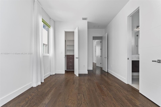 10431 NW 68th Ter, Doral, FL 33178 - unfurnished bedroom featuring wood finished floors and connected bathroom