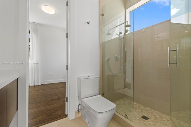 10431 NW 68th Ter, Doral, FL 33178 - full bathroom featuring a shower stall, vanity, and wood finished floors