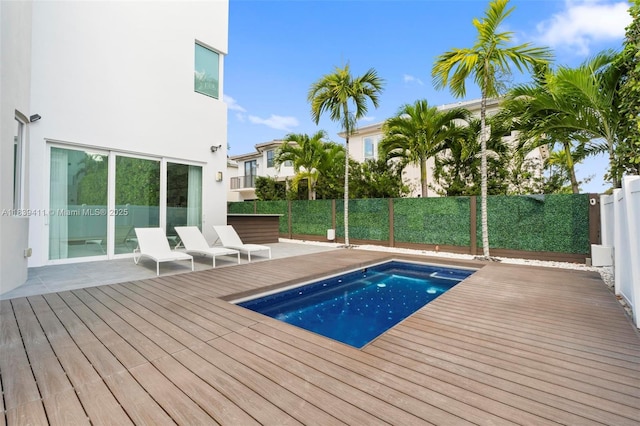 10431 NW 68th Ter, Doral, FL 33178 - view of pool featuring a deck and a fenced backyard