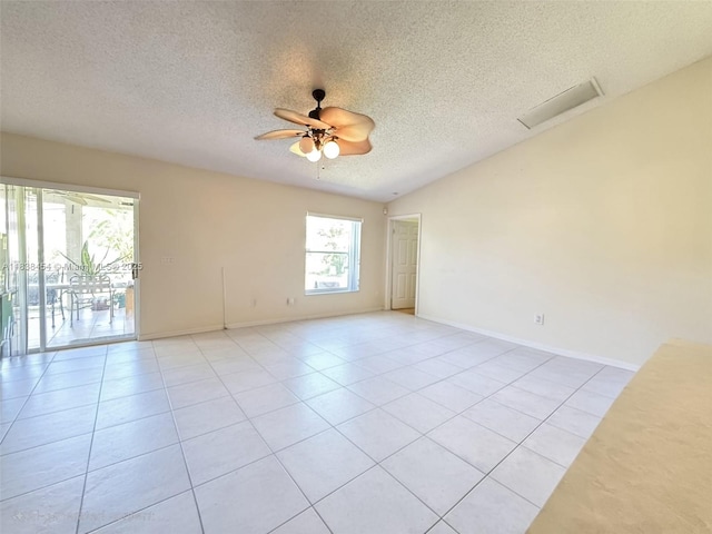 5338 NW S Crisona Cir, Port St Lucie, FL 34986 - unfurnished room featuring a textured ceiling, ceiling fan, and light tile patterned floors