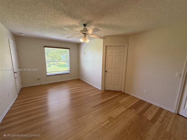 5338 NW S Crisona Cir, Port St Lucie, FL 34986 - empty room with light wood-style flooring, ceiling fan, and a textured ceiling