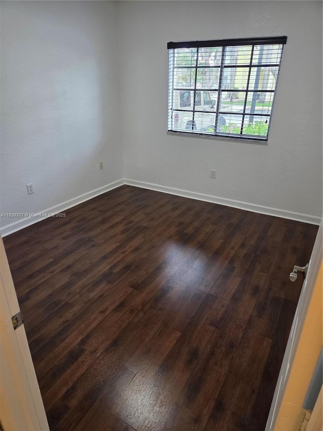 2630 NE 3rd Dr Unit 101, Homestead, FL 33033 - unfurnished room featuring dark wood-style flooring