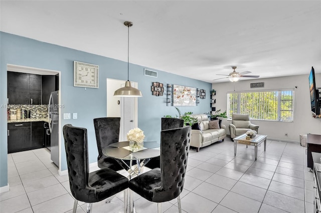 5800 NE 22nd Way Unit 523, Fort Lauderdale, FL 33308 - dining area featuring light tile patterned floors and a ceiling fan