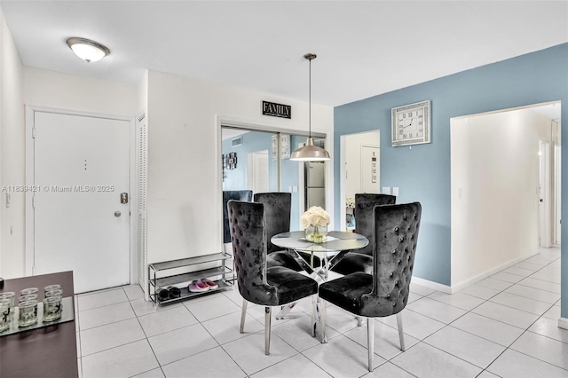 5800 NE 22nd Way Unit 523, Fort Lauderdale, FL 33308 - dining space with light tile patterned floors