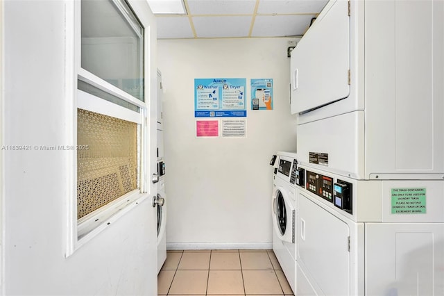 5800 NE 22nd Way Unit 523, Fort Lauderdale, FL 33308 - community laundry room featuring stacked washing machine and dryer, light tile patterned floors, and separate washer and dryer