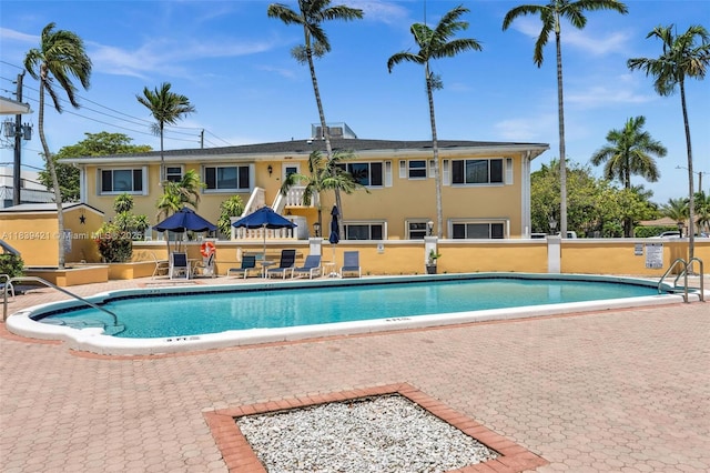 5800 NE 22nd Way Unit 523, Fort Lauderdale, FL 33308 - community pool featuring a patio area
