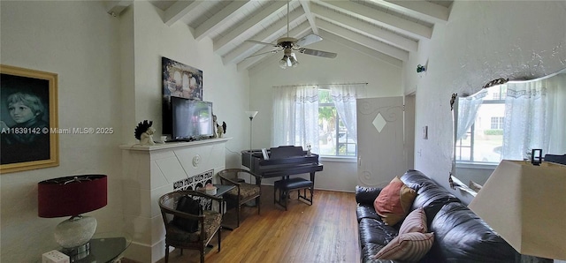 1824 SW 24th St, Miami, FL 33145 - living area with beam ceiling, wood finished floors, a ceiling fan, and high vaulted ceiling