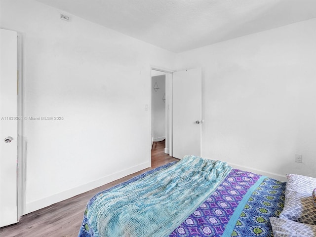 3210 E Elizabeth St, Miami, FL 33133 - bedroom featuring wood finished floors