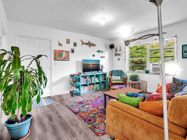 3210 E Elizabeth St, Miami, FL 33133 - living room featuring wood finished floors and baseboards