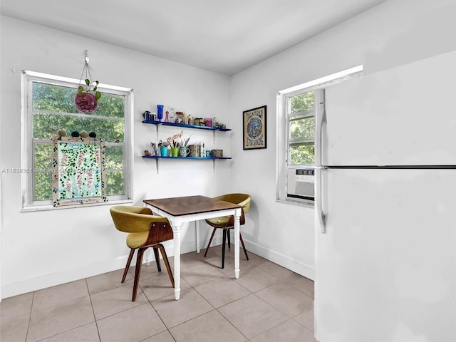 3210 E Elizabeth St, Miami, FL 33133 - dining room featuring light tile patterned flooring