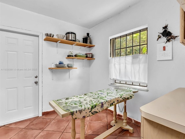 3210 E Elizabeth St, Miami, FL 33133 - mudroom featuring light tile patterned flooring and baseboards