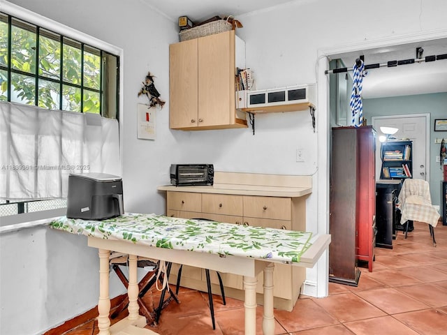 3210 E Elizabeth St, Miami, FL 33133 - kitchen featuring light brown cabinets, light countertops, and light tile patterned floors