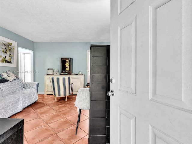3210 E Elizabeth St, Miami, FL 33133 - living area with light tile patterned floors