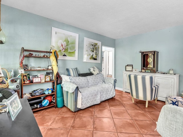 3210 E Elizabeth St, Miami, FL 33133 - living area featuring tile patterned flooring and a textured ceiling