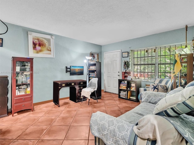 3210 E Elizabeth St, Miami, FL 33133 - living room with light tile patterned floors and a textured ceiling