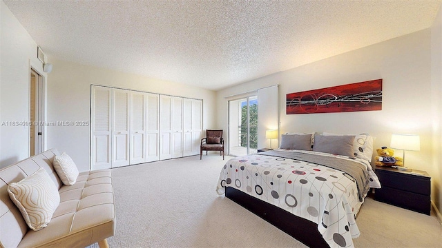 4047 Rexford C Unit 4047, Boca Raton, FL 33434 - carpeted bedroom featuring a closet and a textured ceiling
