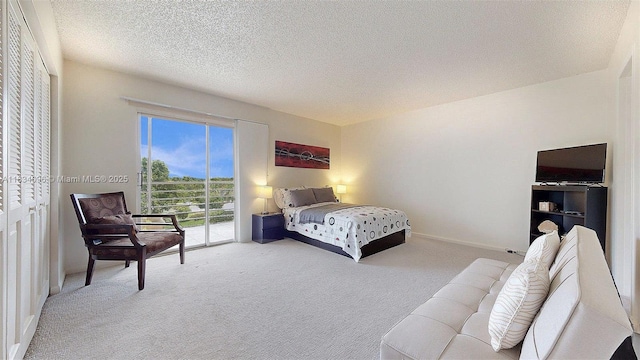 4047 Rexford C Unit 4047, Boca Raton, FL 33434 - carpeted bedroom featuring access to outside and a textured ceiling