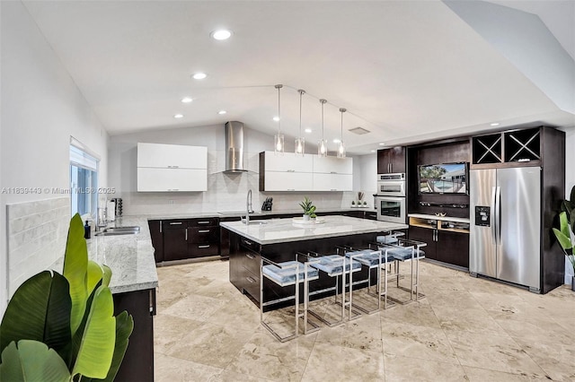 614 SE 12th Ave, Deerfield Beach, FL 33441 - kitchen featuring appliances with stainless steel finishes, wall chimney exhaust hood, modern cabinets, a kitchen island, and tasteful backsplash
