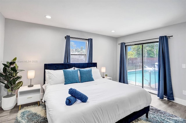 614 SE 12th Ave, Deerfield Beach, FL 33441 - bedroom featuring access to exterior, wood finished floors, and recessed lighting