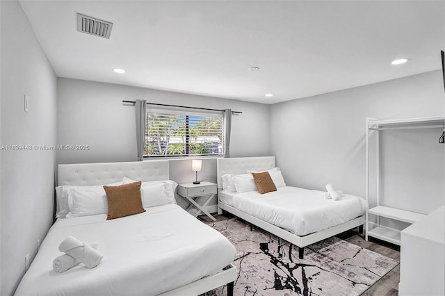 614 SE 12th Ave, Deerfield Beach, FL 33441 - bedroom featuring recessed lighting and wood finished floors